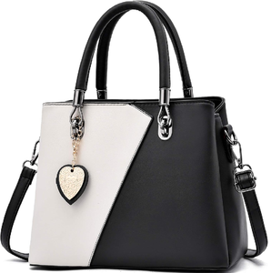 Classic <b>navy</b> nylon tote with brown <b>leather</b> flap. Lightweight and timeless. Available at wholesale prices. - Product Image 6