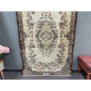 Vintage Turkish Rug, 3.9x6.4 ft Rug, <b>Brown</b> Animal Print <b>Wool</b> Rug - Product Image 1