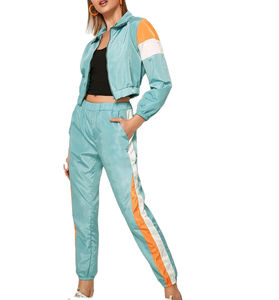 Conjunto de chándal cortavientos personalizado de alta calidad para mujer, chándal de poliéster, repelente al agua, transpirable, a prueba de viento, chándal para mujer - Product Image 2