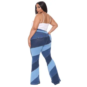 Eleganza eclettica in Denim Wave: Jeans svasati unici con doppia tonalità di blu intenso e Design a punto croce