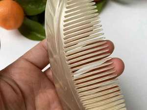 หวีเขาควายทำมือคุณภาพพรีเมียม ป้องกันไฟฟ้าสถิต กันน้ำ รูปทรงวงรี สไตล์เรียบง่าย สำหรับดูแลและจัดแต่งทรงผม - Product Image 3