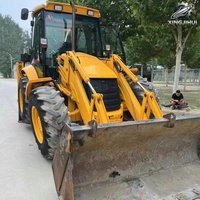 Chargeuse sur pneus JCB 4CX d'occasion, 8,6 tonnes, godet de 1 m, marque britannique d'origine, certifiée CE, avec moteur.