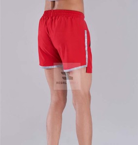 Pantalones cortos de gimnasio para hombre al por mayor, pantalones cortos atléticos con patrón sólido, cintura elástica, pantalones cortos transpirables informales ecológicos con bolsillos para correr - Product Image 2