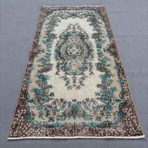 Alfombra Vintage de 3.5x6.9 pies, Alfombra Turca, Alfombra Marrón con Puntos - Product Image 1