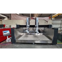 Máquina de Grabado CNC de Doble Cabezal y 4 Ejes con Giro de 180° °   Ejes Rotatorios