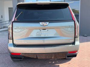 รถ Cadillac Escalade ปี 2024 รุ่น 600 7 ที่นั่ง เกียร์อัตโนมัติ SUV ภายในตกแต่งด้วยหนัง ยาง R20 ไฟ LED หลังคาพาโนรามา พวงมาลัยซ้าย - Product Image 1