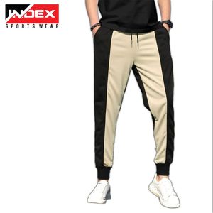 ผู้ผลิตขายส่งกางเกงวอร์มผู้ชาย กางเกงจ็อกเกอร์แบบสั่งทำ OEM ผ้าคุณภาพพรีเมียม จำนวนมาก - Product Image 1