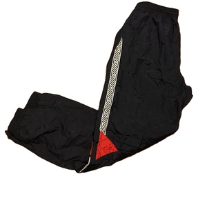 Pantalones de chándal transpirables de nailon Unisex al por mayor, ropa de calle, pantalones de chándal de pierna ancha holgados reflectantes, diseño de rayas laterales, Parte delantera plana - Product Image 1