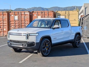 รถกระบะ (W&T) มือสอง ปี 2026 Rivian R1T Tri 4 ประตู แบบมีแค็บหลังคา ขับเคลื่อนสี่ล้อ รุ่น SB พร้อมแบตเตอรี่ Max (รถยนต์ไฟฟ้า) 5 ที่นั่ง เกียร์อัตโนมัติ - Product Image 5