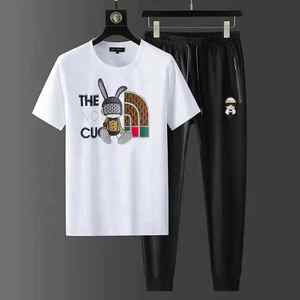 OSTROWEARS ENTERPRISES-Chándal de nailon de alta calidad para hombre, conjunto ligero impermeable de verano con pantalones cortos multibolsillos - Product Image 5