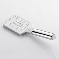 Pommeau de douche à haute pression à commande par bouton, design rectangulaire chromé blanc, débit d'eau important, jet pluie et massage, 3 fonctions