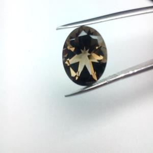 Checker de forme ronde brillante coupe saphir brun traité thermiquement créé pierre précieuse en vrac - Product Image 1