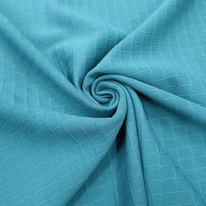 Tela de punto con volantes de alta calidad, mezcla de Spandex de poliéster, resistente al encogimiento antiestático, estirable, fábrica de textiles duraderos OEM - Product Image 1