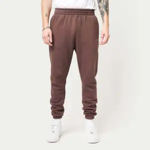 Üretici boş cepler ile yüksek kalite % 100% pamuk Sweatpants özel Logo Sweatpants erkekler Jogger