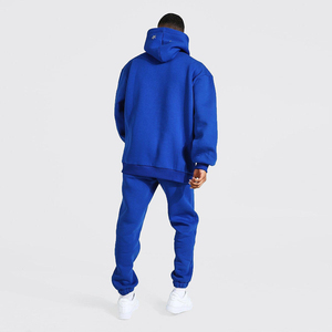 Ensemble de survêtement deux pièces en molleton de coton épais, imprimé, à capuche, avec strass, coupe oversize, style streetwear, et pantalon jogger évasé - Product Image 1