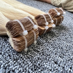 Vente en gros 30 pouces Virgin Raw Remy Body Wave Tape-In Extensions de cheveux humains pour les femmes - Product Image 2