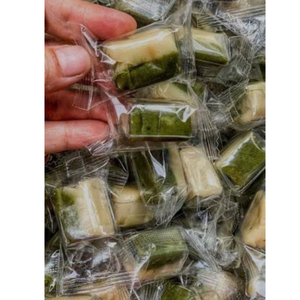 Sweet coconut candy <b>cubes</b> with chewy core and aromatic touch, ideal for trays, <b>baskets</b>, and bulk - Product Image 1