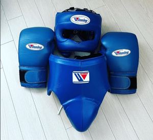 Muay Thai kick boxing professionnel en cuir véritable OEM les plus vendus en ligne Ensemble de boxe unisexe pour entraînement de gym - Product Image 1