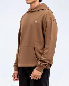 Sudadera minimalista marrón de gran tamaño con logotipo pequeño, ropa de calle informal, moda y bolsillo delantero, fabricada por Huzaifa Products - Product Image 3