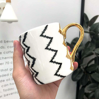 Tasse en porcelaine de luxe de Chaozhou, en porcelaine fine, écologique, de haute qualité, avec poignée ergonomique, logo personnalisé, faible MOQ, pour usage festif