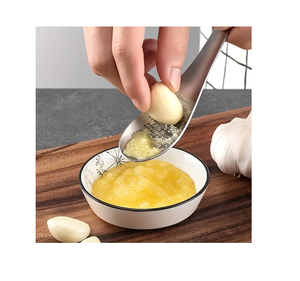 Proveedor al por mayor Cuchara trituradora de jengibre de acero inoxidable Herramienta de molienda de ajo de limón y jengibre de acero inoxidable - Product Image 1