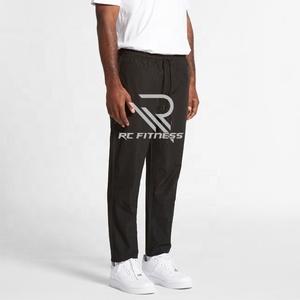 Pantalon de sport décontracté pour homme, séchage rapide, extensible, couleur unie, taille mi-haute, coupe droite ample, respirant, en soie glacée, confortable - Product Image 4