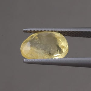 พลอยไพลินสีเหลืองสดใสทรงรีขนาด 11.5x9 มม. น้ำหนัก 5 กะรัต ได้รับการรับรองจาก IGI แท้ 100% คุณภาพดี ผ่านการเคลือบแว็กซ์/น้ำมัน - Product Image 2