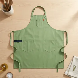 Tablier Vert Sans Manches avec 3 Poches en Toile 100% Coton Écologique Lavable en Machine pour la Cuisine et l'Usage Quotidien Classique - Product Image 1