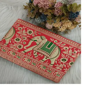 custom made in elephant embroidery on red colour in ethnic designs for various purposes in different sizes for resale purposes.