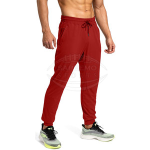 Pantalon de jogging décontracté pour homme en toile légère coupe-vent avec poches zippées pour un rangement sécurisé pendant les activités sportives et les voyages - Product Image 1
