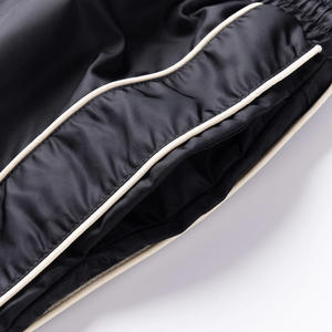 กางเกงกันลมปรับแต่งได้กางเกงกันน้ำน้ำหนักเบาพร้อมตัวเลือกการพิมพ์โลโก้สำหรับการฝึกวิ่งกลางแจ้งและใช้ในชีวิตประจำวัน - Product Image 3