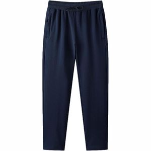 กางเกงวิ่งลำลองผู้ชายผ้าแคนวาสน้ำหนักเบา แห้งเร็ว ระบายอากาศดี ผ้าไหมน้ำแข็ง เอวยางยืด สีพื้น ขายส่ง - Product Image 4