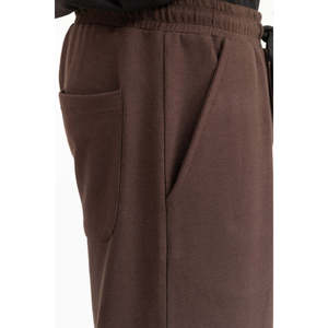 กางเกงจ็อกกิ้งเอวยางยืดพิมพ์โลโก้ได้ตามต้องการ รุ่น MN-JGP-WS25-002 กางเกงชิโน่ทรงหลวมสบายๆ ตกแต่งด้วยซิป - Product Image 5