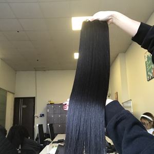 Article chaud Extensions de cheveux humains vietnamiens bruts de qualité 8A soyeux Super noir Style de vague de Machine de trame de génie - Product Image 1