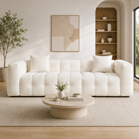 Canapé moderne en tissu texturé blanc, écologique, rembourré en éponge, avec accoudoirs arrondis et sièges capitonnés pour hôtels et appartements