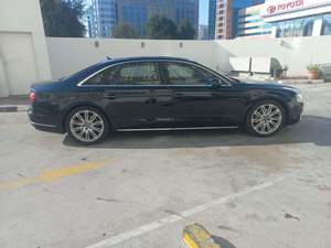 Audi A8 50 TFSI 4.5L V6 d'occasion automatique à traction intégrale avec sièges en cuir, intérieur foncé, essence, toit ouvrant panoramique, caméra de recul 360° - Product Image 3