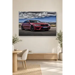 Impression sur toile de la BMW M5 Fida Burgundy sous des nuages spectaculaires - Product Image 1