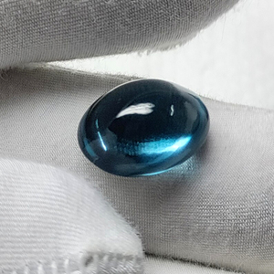 Attractive London Blue Topaz 11x9mm - 12x10mm พลอยรูปไข่สีน้ำเงินเข้ม Topaz Cabochon จากเหมืองบราซิล - Product Image 2