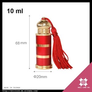 Flacon de parfum Attar de haute qualité de 5 ml, élégant cylindre vide avec surface sérigraphiée, breloque en forme de pompon et bouchon à vis - Product Image 4