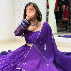 Lehenga Choli de style designer de luxe imprimé avec des travaux de miroir lourds, idéal pour les mariages, les fiançailles, les festivals, les tenues de soirée pour femmes - Product Image 1