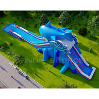 Toboggan gonflable géant Toboggan gonflable sur le thème des requins avec piscine