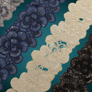 Dentelle de créateur luxueuse avec des motifs complexes et des détails élégants, parfaite pour la mode haut de gamme, vêtements de mariée - Product Image 1