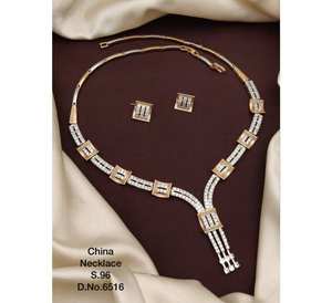 Elegante conjunto de ropa de compromiso de boda de acero inoxidable para mujer con hermoso diseño chapado en oro de doble piedra para ocasiones de regalo - Product Image 1