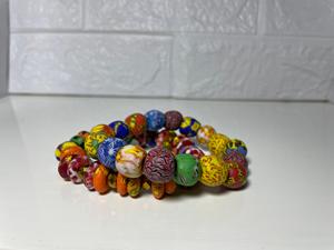 Pulsera étnica hecha a mano con cuentas, patrón de flores redondas, cuerda elástica, joyería de moda unisex - Product Image 3