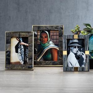 Decorative horn <b>photo</b> <b>frame</b> with <b>deep</b> earthy tones ideal for rooms featuring natural materials textures and rustic themes - Product Image 1