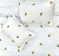 Ensembles de literie personnalisés en gros 100% coton housse de couette taies d'oreiller brodées tournesol motif végétal pour la maison hôtel mariage