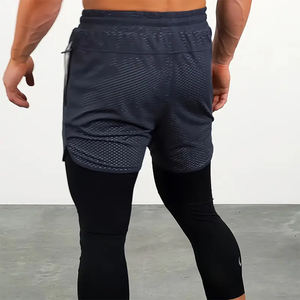 กางเกงขาสั้นตาข่ายสำหรับเด็กผู้ชายสีดำระบายอากาศได้ดีสวมใส่สบายกางเกงฝึกกีฬาผ้าตาข่ายวิ่ง - Product Image 2