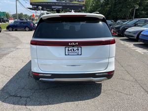 Blanco brillante 2024 Kia Carnival SX FWD usado con ruedas de aleación asientos de cuero sistema de navegación arranque remoto Android Auto - Product Image 3