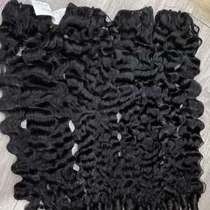 Vente en gros Paquet trame birmane bouclée couleur naturelle cheveux humains bruts vietnamiens Double dessiné un donneur Extension de cheveux de haute qualité - Product Image 3