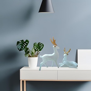รูปปั้นกวางเรนเดียร์สีขาวหรูหราทันสมัยเน้นที่บ้านเหมาะสำหรับการตกแต่งในวันคริสต์มาสของตกแต่งสำนักงานหรือของขวัญกลางงานแต่งงานในฤดูหนาว - Product Image 6